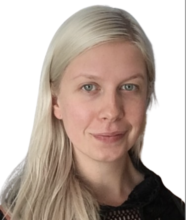 A smiling white woman with long blond hair wearing a black shirt.
